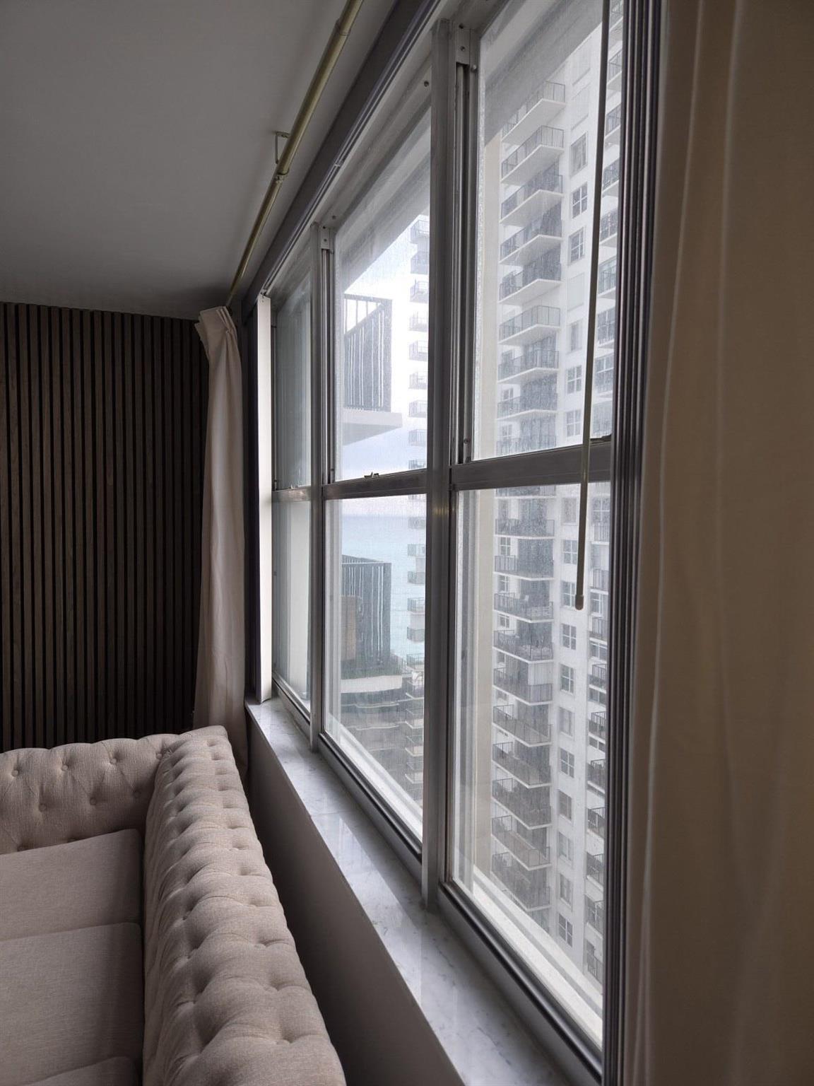 QUADOMAIN TOWER I AND IV - Residential Lease