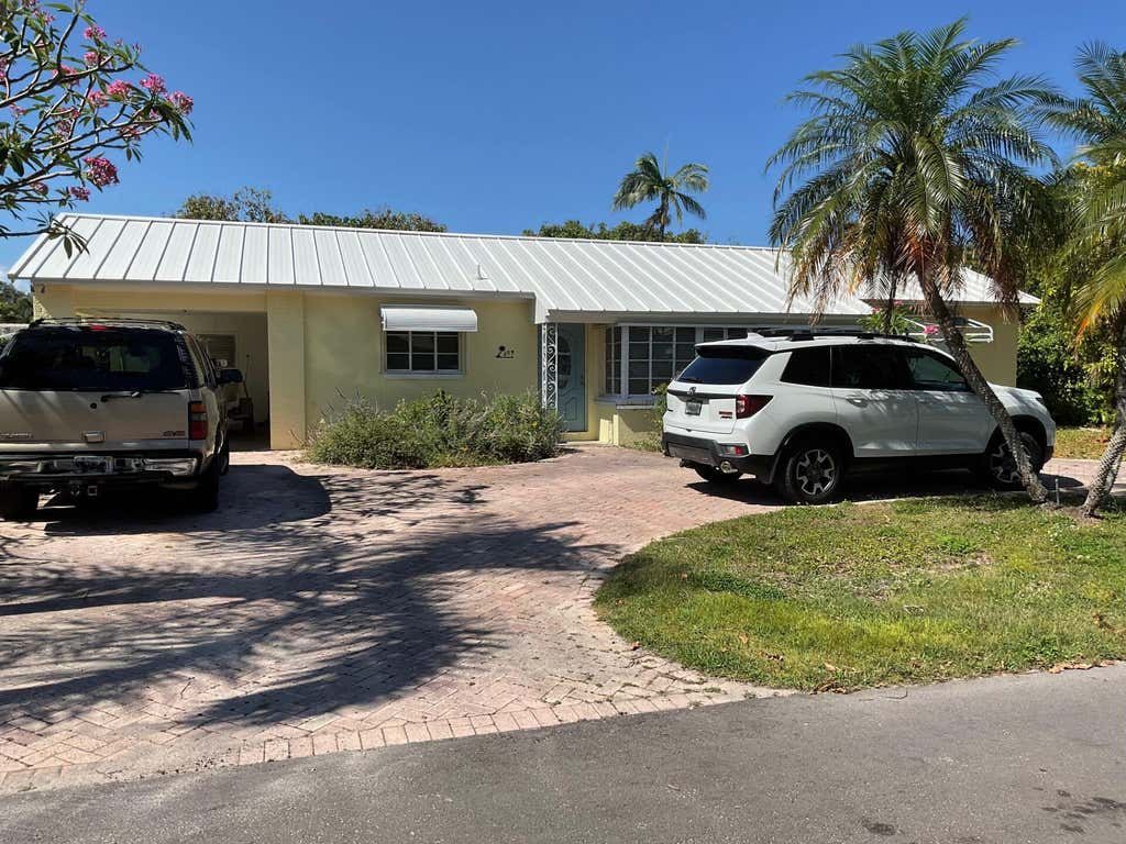 Photo of 309 Cascade Lane, Palm Beach Shores, FL 33404 (MLS # R10984357)