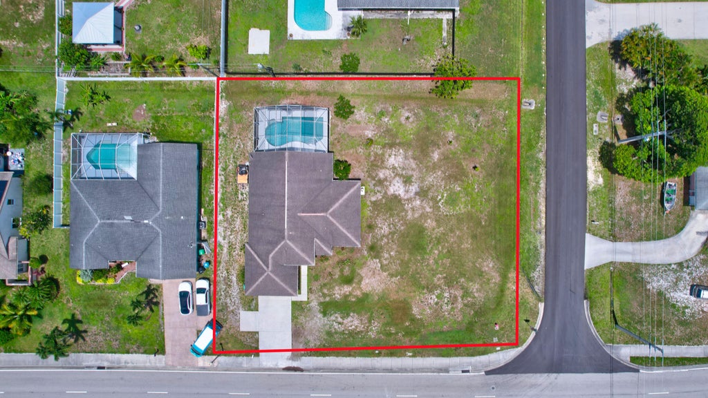 Photo of 1591 SE Airoso Boulevard, Port Saint Lucie, FL 34953 (MLS # R10999399)