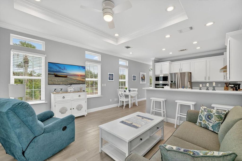 Photo of 301 NE Coastal Drive, Jensen Beach, FL 34957 (MLS # R11124042)