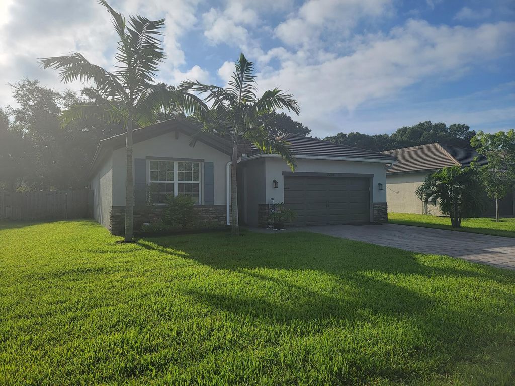 Photo of 2204 SW Strawberry Terrace, Palm City, FL 34990 (MLS # R10907574)