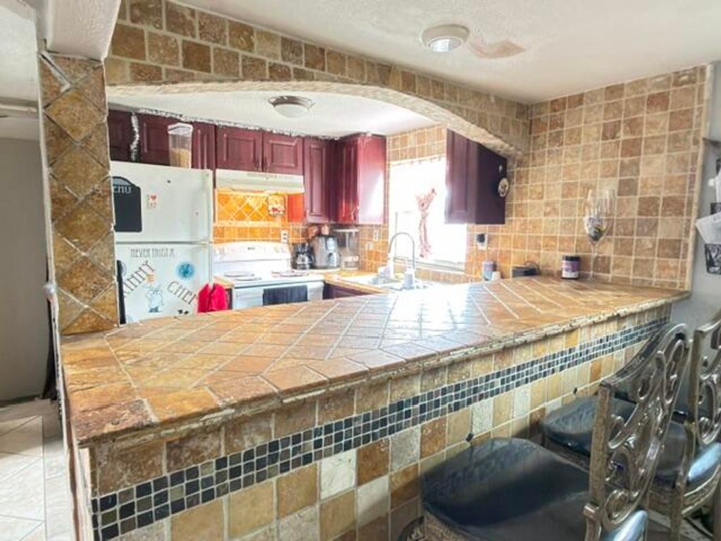 Photo of 1185 Alto Road, Lake Worth, FL 33462 (MLS # B26034771)
