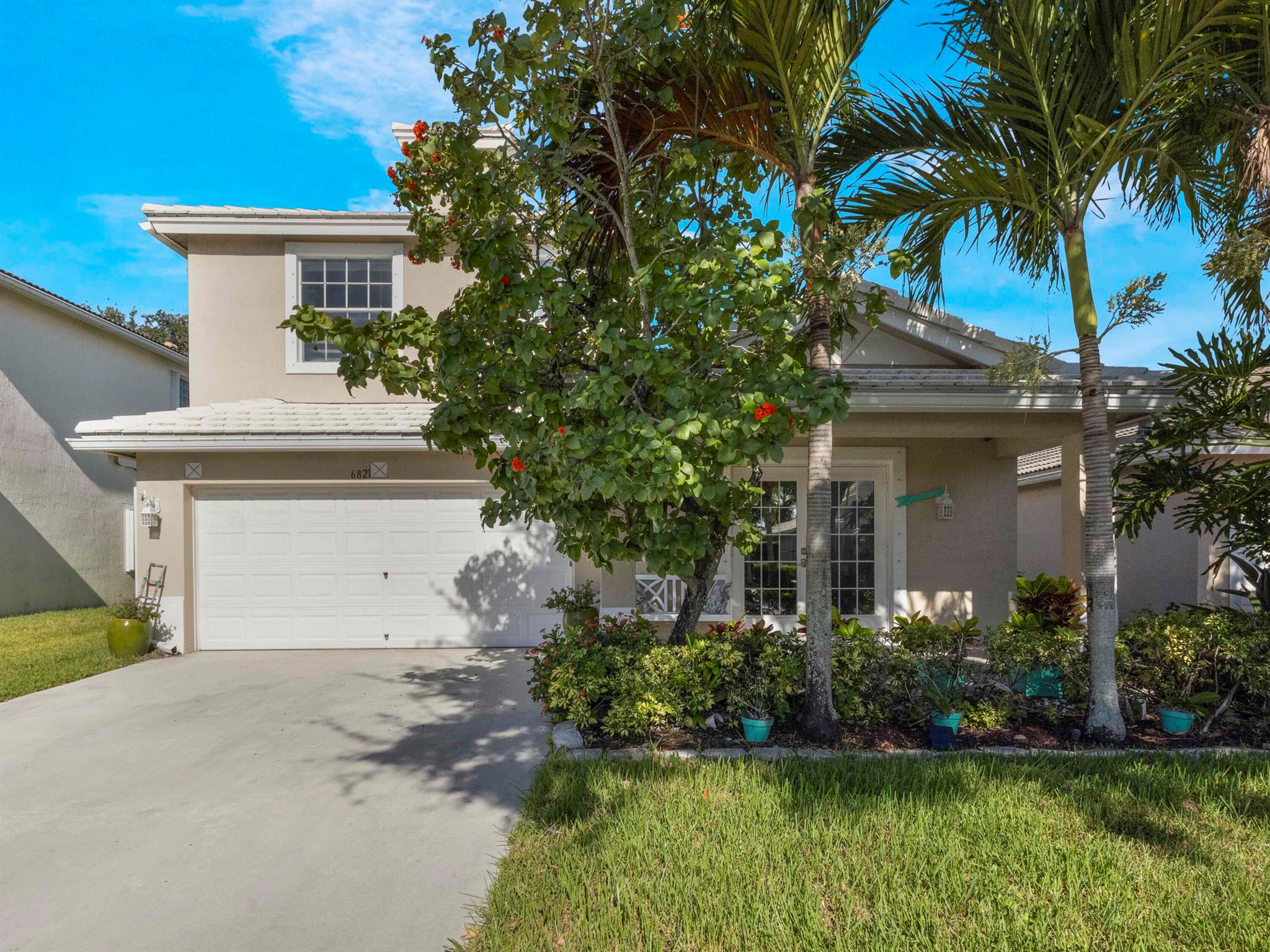 Welcome to luxury living in the heart of Lake Worth! This upgraded 4-bed, 3-bath waterfront home blends modern elegance with everyday comfort. Enjoy a bright, open floor plan featuring a fully extended kitchen with quartz countertops, custom dry bra, and premium cabinetry - ideal for entertaining. The living room showcases a built-in media center and electric fireplace. The spa-like master suite offers dual vanities, marble finishes, walk-in shower and spacious walk-in closets. A renovated guest bath and upstairs loft offer versatile space. Highlights: 2022 HVAC, 2025 Water Heater, covered patio with waterfront views, low maintenance yard and updated lighting. Nearby to shops, restaurants, I-95 and turnpike. Schedule your private showing today!