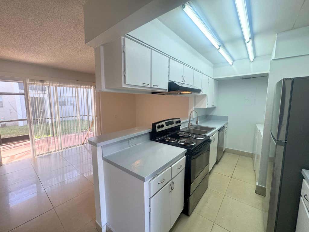 Photo of 4423 Treehouse Lane #21c, Tamarac, FL 33319 (MLS # B26044336)