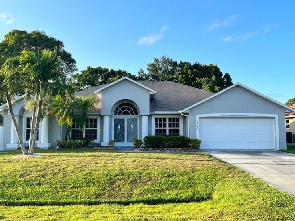 Photo of 2549 SE Tiger Avenue Ave, Port St Lucie, FL 34952 (MLS # R10794669)