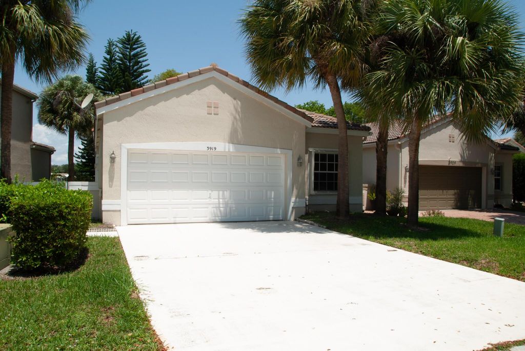 Photo of 3919 NW 62 Court NW, Coconut Creek, FL 33073 (MLS # R10904120)