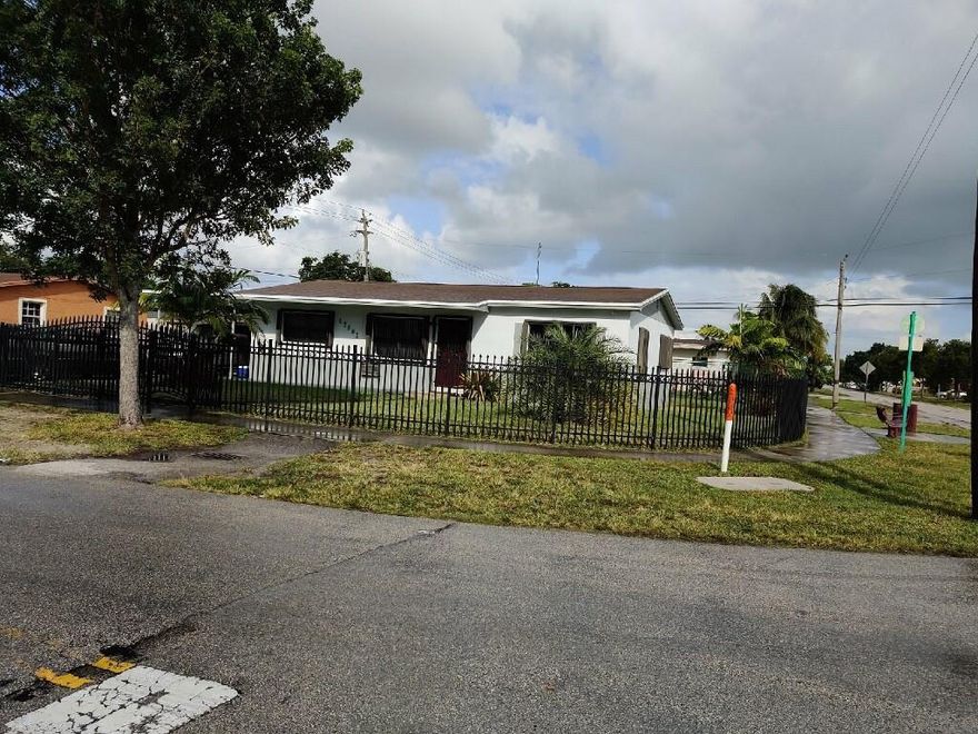 EASY TO SHOW!! BEAUTIFUL CORNER LOT HOME WITH A TOTALLY FENCED EXTRA LARGE YARD. HOME HAS NEW FLOORING, STAINLESS STEEL APPLIANCES, AND UPGRADES ADDED TO THE BATHROOMS. THERE IS A DEN WHICH CAN BE USED AS A 4TH BEDROOM.  YOU WILL LOVE THIS QUIET FAMILY-ORIENTED NEIGHBORHOOD.  THIS HOME IS CENTRALLY LOCATED NEAR I-95 EXPRESSWAY,  PALMETTO EXPRESSWAY, AND THE TURNPIKE.  HURRICANE ACCORDION SHUTERS ON EVERY WINDOW.