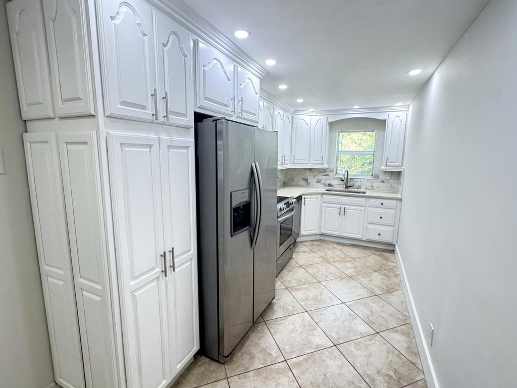 Photo of 853 SE 4th Court, Deerfield Beach, FL 33441 (MLS # B26058014)