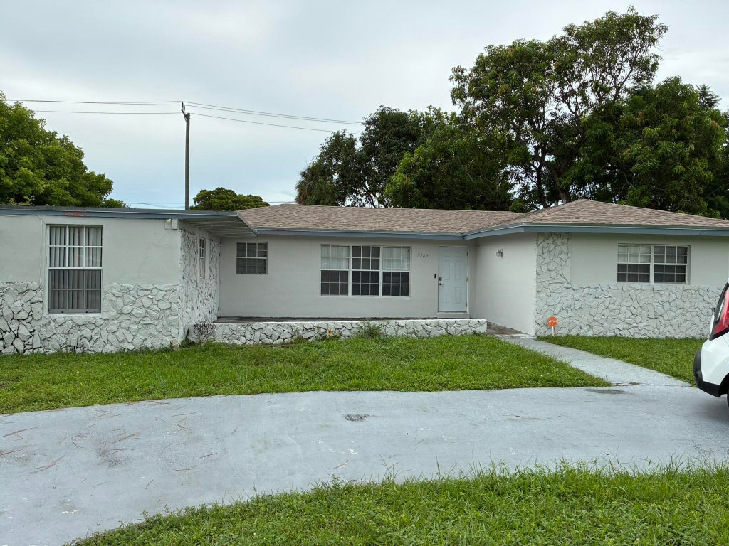 Photo of 3307 AUBURN Boulevard, Fort Lauderdale, FL 33312 (MLS # B26074180)