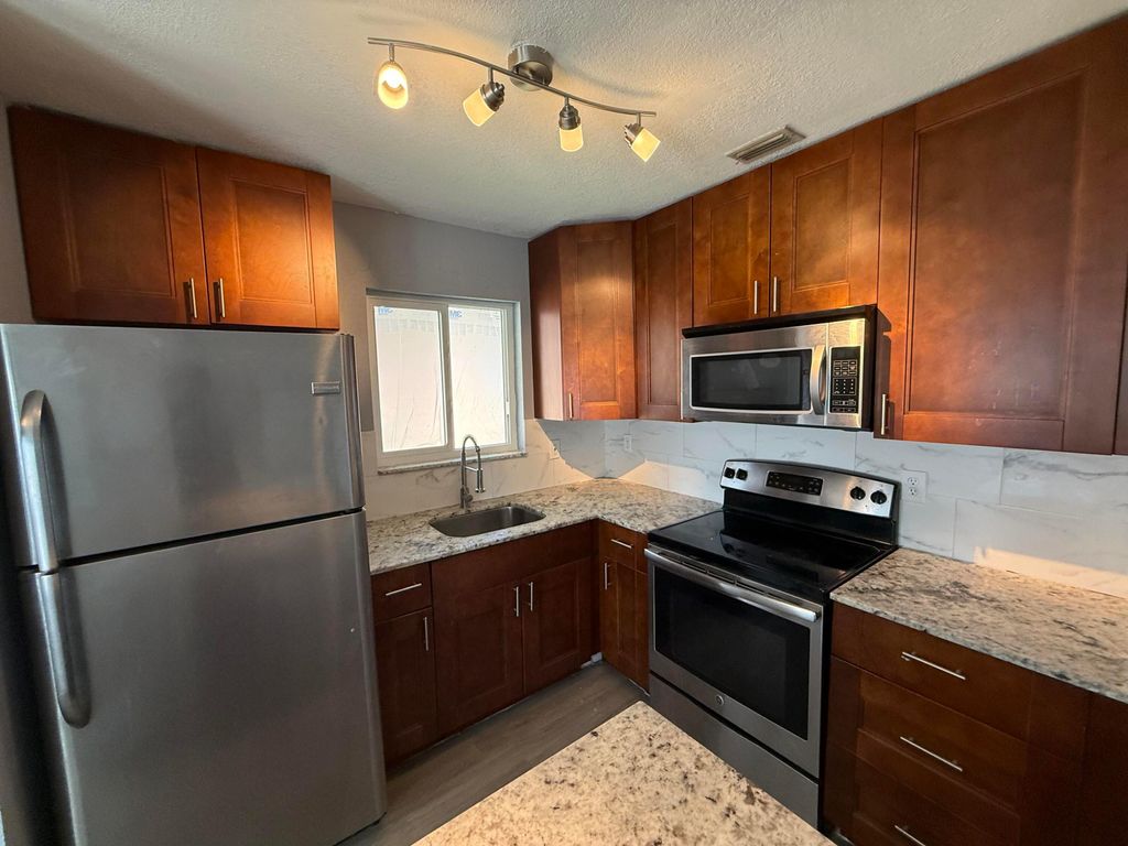 Photo of 5441 SW 18th Street, West Park, FL 33023 (MLS # B26014991)