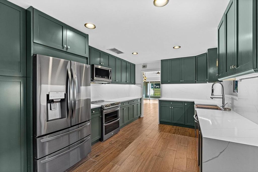 Photo of 2431 SW Brookwood Lane, Palm City, FL 34990 (MLS # R11150454)