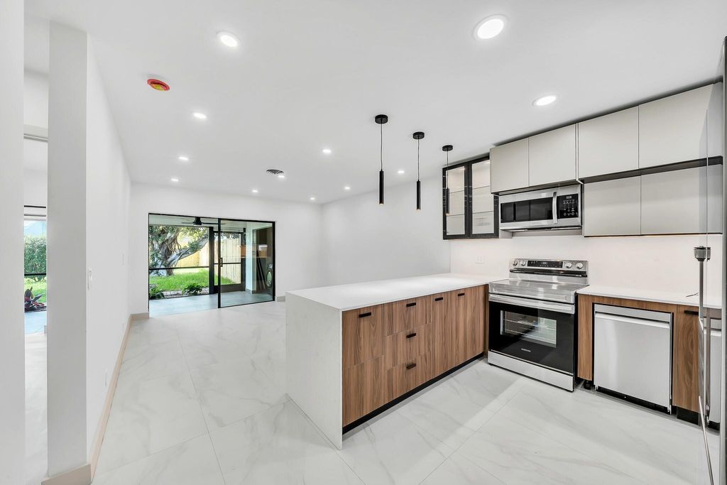 Photo of 2599 NE 2nd Ave, Boca Raton, FL 33431 (MLS # F10526764)