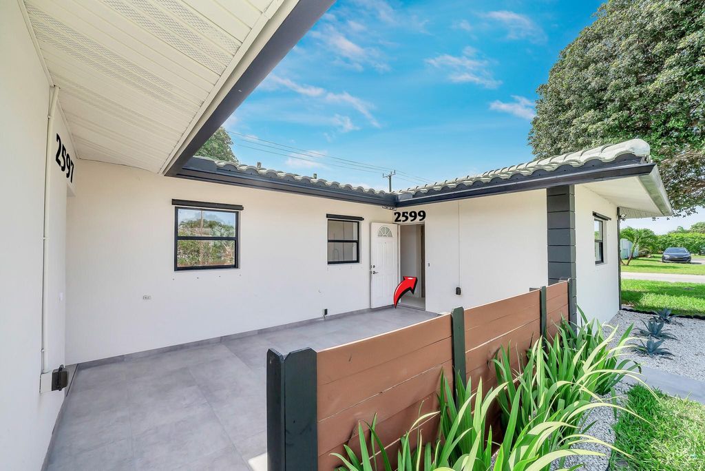 Photo of 2599 NE 2nd Ave, Boca Raton, FL 33431 (MLS # F10526764)