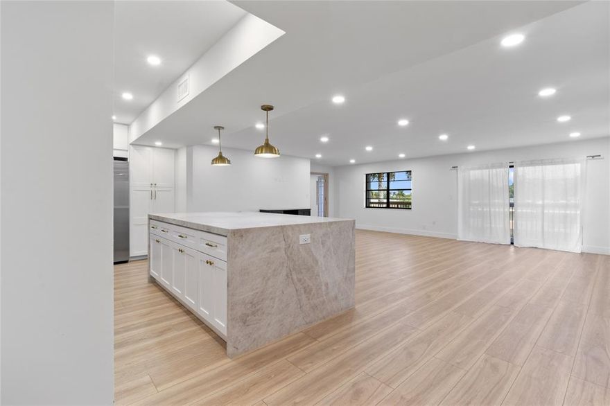 Luxury 3BR/3BA condo in Hallandale Beach—fully renovated with designer finishes. Open-concept living area offers a bright, spacious layout perfect for entertaining. Chef’s kitchen features a stunning oversized island crafted from premium Taj Mahal quartzite, custom cabinetry, and high-end stainless appliances. Wide-plank hardwood floors, recessed LED lighting, and abundant natural light throughout. All three full bathrooms updated with modern fixtures and premium finishes. Building amenities include resort-style pool, secure entry, and well-maintained common areas. Minutes from dining, shopping, I-95, and the beach. 
Easy to show—call listing agent today!