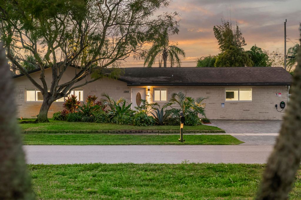 Photo of 1265 Wynnewood Drive, West Palm Beach, FL 33417 (MLS # B26011024)