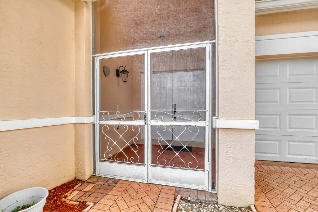 Photo of 180 Caribe Court, Greenacres, FL 33413 (MLS # B26036796)