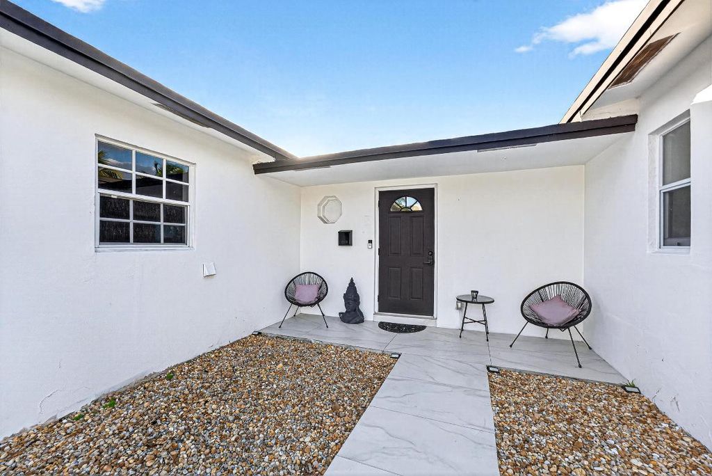 Photo of 851 SW 67th Avenue, North Lauderdale, FL 33068 (MLS # R11156908)