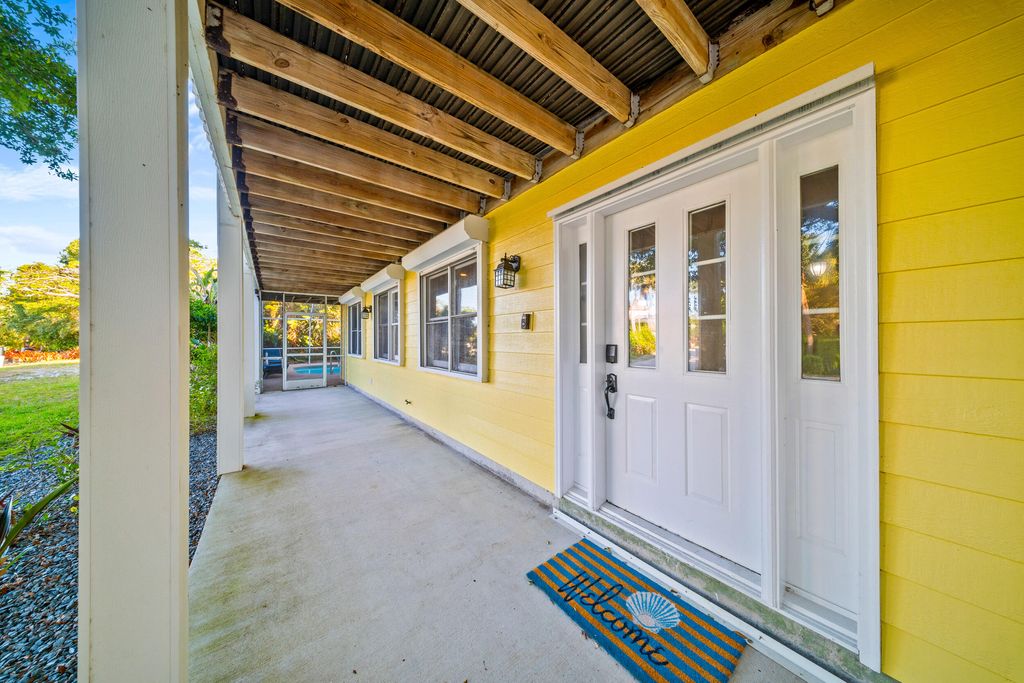 Photo of 3900 NE Cheri Drive, Jensen Beach, FL 34957 (MLS # R11090766)