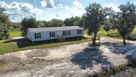 Photo of 17484 NW 290 Street, Okeechobee, FL 34972 (MLS # R11135189) Photo of 17484 NW 290 Street, Okeechobee, FL 34972 (MLS # R11135189)