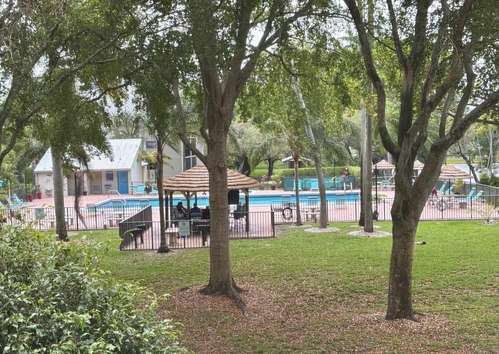 Photo of 2112 S Cypress Bend Drive #203, Pompano Beach, FL 33069 (MLS # F10504934)