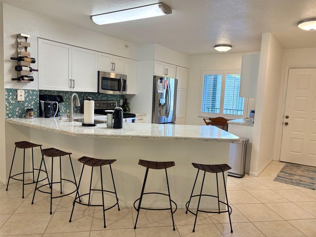 Photo of 2112 S Cypress Bend Drive #203, Pompano Beach, FL 33069 (MLS # F10504934)