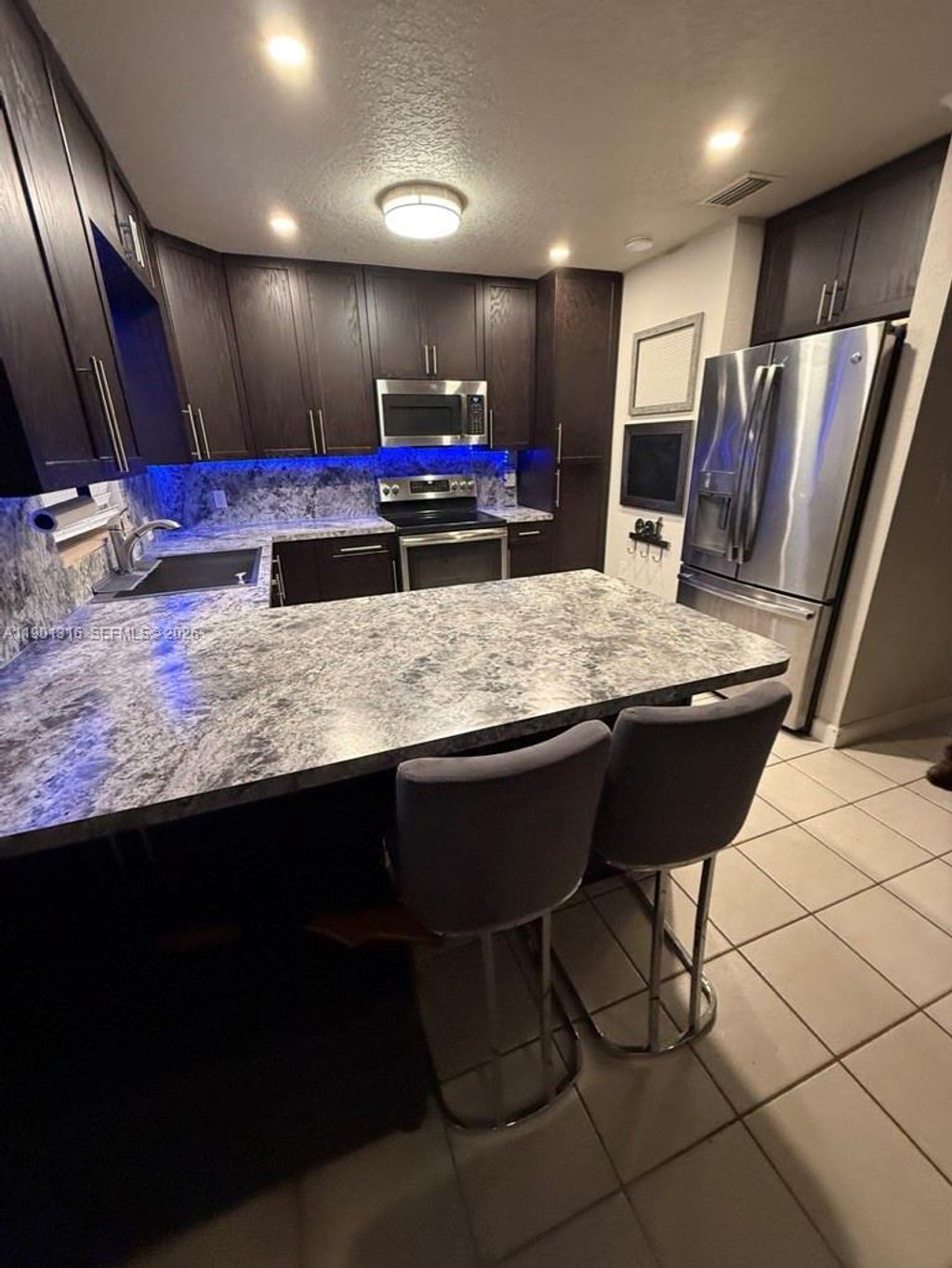 Photo of 9546 SW Adams Street, Okeechobee, FL 34974 (MLS # B26015919)