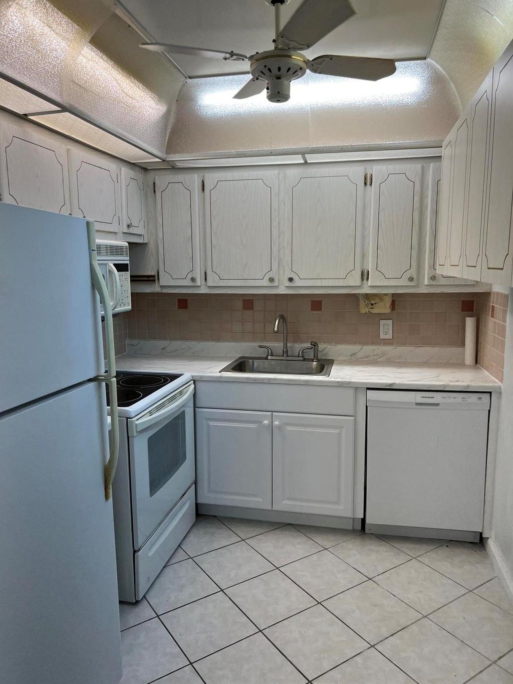 Photo of 66 Windsor D, West Palm Beach, FL 33417 (MLS # R11147871)