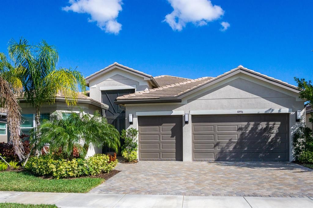 Photo of 10996 SW Ivory Springs Lane, Port Saint Lucie, FL 34987 (MLS # R10689398)