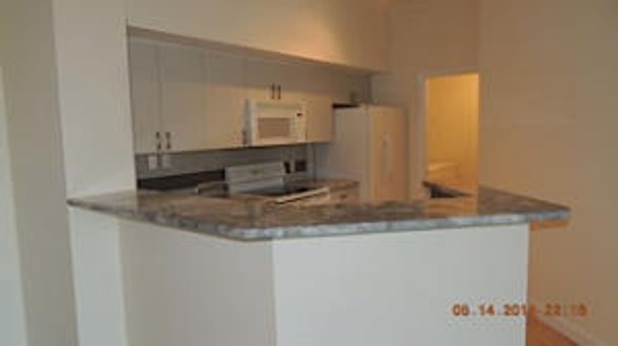 Spacious apartment at St. Andrews at the Polo Club, centrally located in the heart of Wellington. Light and bright, freshly painted, 3rd floor 2BR 2BA (en suite) with amazing lake view and fireplace. Upgraded kitchen with granite countertop, under mount sink and modern fixtures, tile flooring throughout, upgraded bathroom highlighted by a frameless walk in shower and walk in closets. Separate laundry room with washer & dryer. Convenient front facing garage included, with a second garage available at additional rent. Community has resort style pool, fitness center, tennis courts, community room and on site security. Some pet restrictions apply. Owner negotiable.