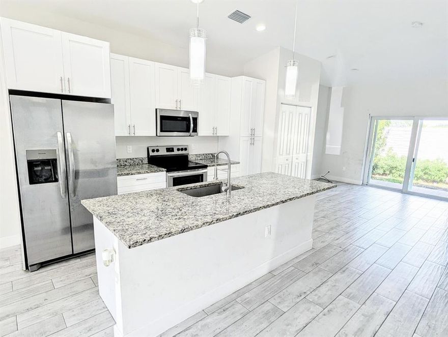 No HOA—ideal for both annual rentals or Airbnb income. 2 identical units. Each unit features 3 bedrooms and 2 bathrooms with an open-concept layout, plank tile flooring, and 42-inch white shaker cabinetry paired with stainless steel appliances. Additional highlights include impact windows, a fenced backyard, professionally landscaped grounds with an irrigation timer, a tankless water heater, a paver driveway, and much more.