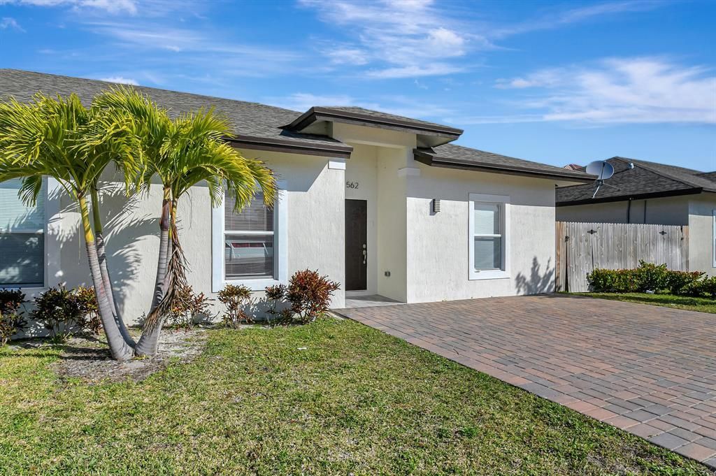 Photo of 15621566 W 26th Court, Riviera Beach, FL 33404 (MLS # B26018837)