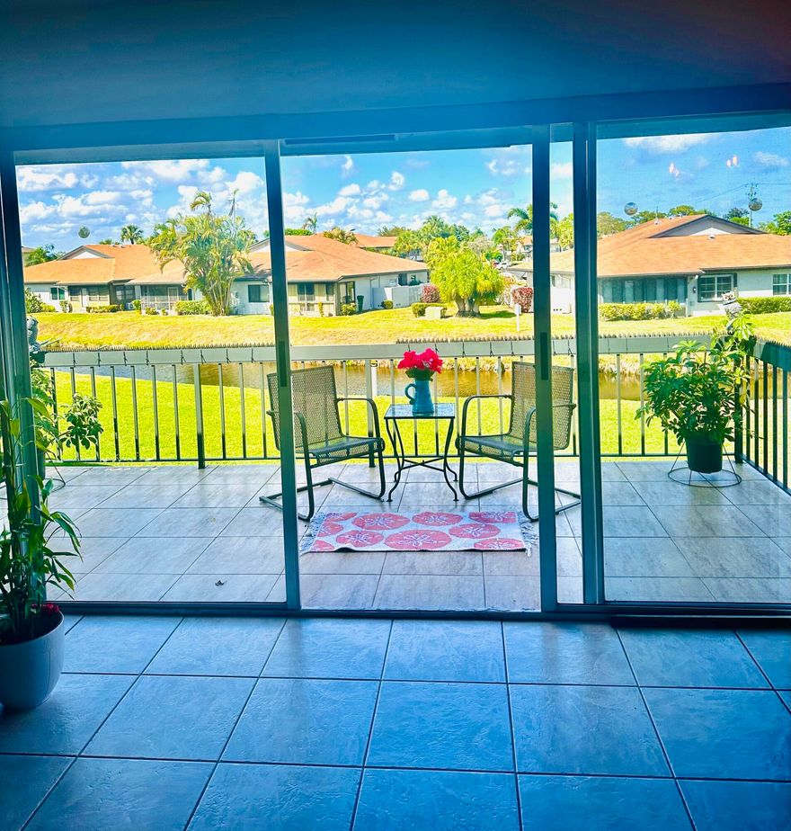 RARELY AVAILABLE FLOOR PLAN! Only 7 in entire community! This bright and spacious 2nd floor corner unit, 2-Bedroom, 2-Bath condo offers and open and inviting layout with beautiful views overlooking the lush grounds and canal.  Enjoy the convenience of a washer & dryer in the unit, an eat-in kitchen, and a large primary suite.   Relax and unwind on the expansive priate balcon, perect for enjoying peaceful mornings and breezy evenings.  The well-designed floor plan provides generous living space and natural light throughout. Enjoy an active lifestyle with a New Clubhouse!  Tennis, Pickle ball, fitness center, etc... Minutes from beaches, dining and shopping.  This condo offers the perfect combination of comfort, location, and lifestyle!  Easy to view!