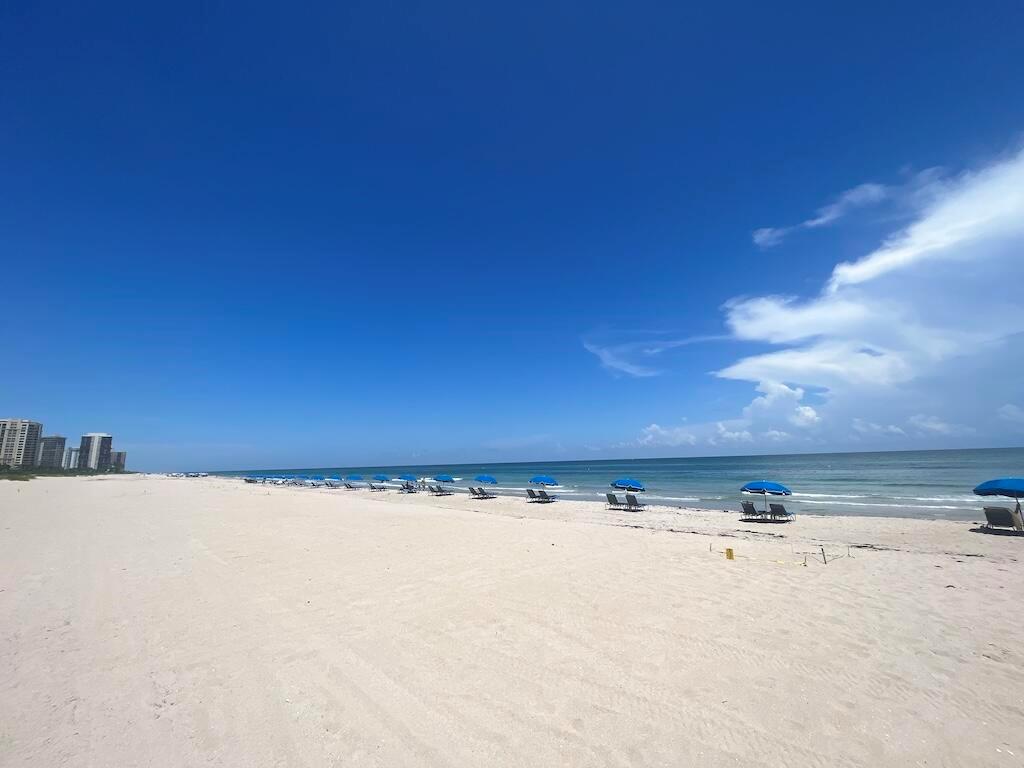 Lower Penthouse w/direct access to the best private beach on Singer Island. Comfortable and quiet in renovated building. Breathtaking ocean and Intracoastal views from all rooms & balcony. Two large bedrooms (one w/king bed, & the other w/ twin beds) each with their own bath(split-plan). Fully equipped kitchen. High Speed fiber-optic Internet + TV included (1 in each room). Designated self-parking. Wide beach w/no rocks, heated pool, sauna, gym, tennis courts &club house with barbecue. Beach service available. Minutes from shopping, dining and entertainment, 5 minutes from McArthur Beach State Park & Sailfish Marina. (all measurements approximate)