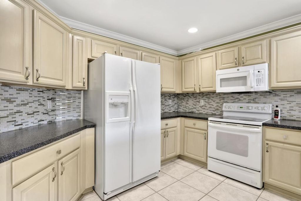 Photo of 4066 Crescent Creek Street, Coconut Creek, FL 33073 (MLS # R11098756)