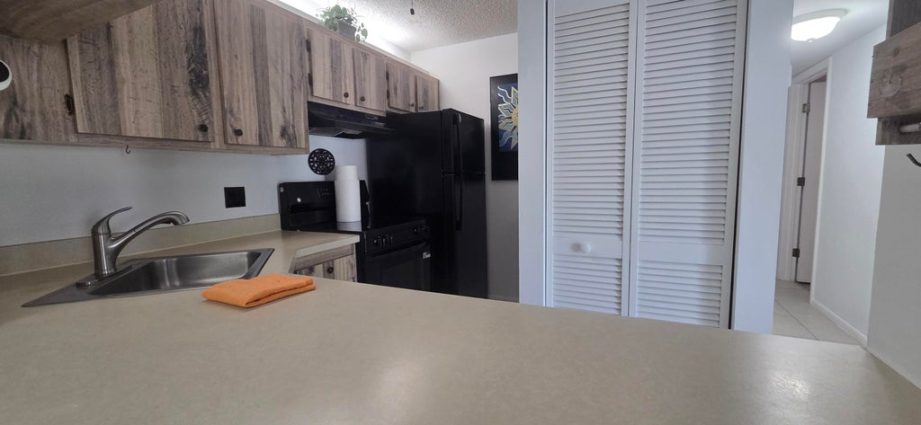 Photo of 618 SEA PINE Way #B2, Greenacres, FL 33415 (MLS # B26071446)