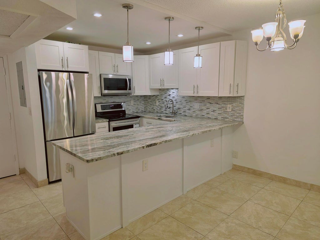 Photo of 255 S Cypress Road #315, Pompano Beach, FL 33060 (MLS # B26087956)