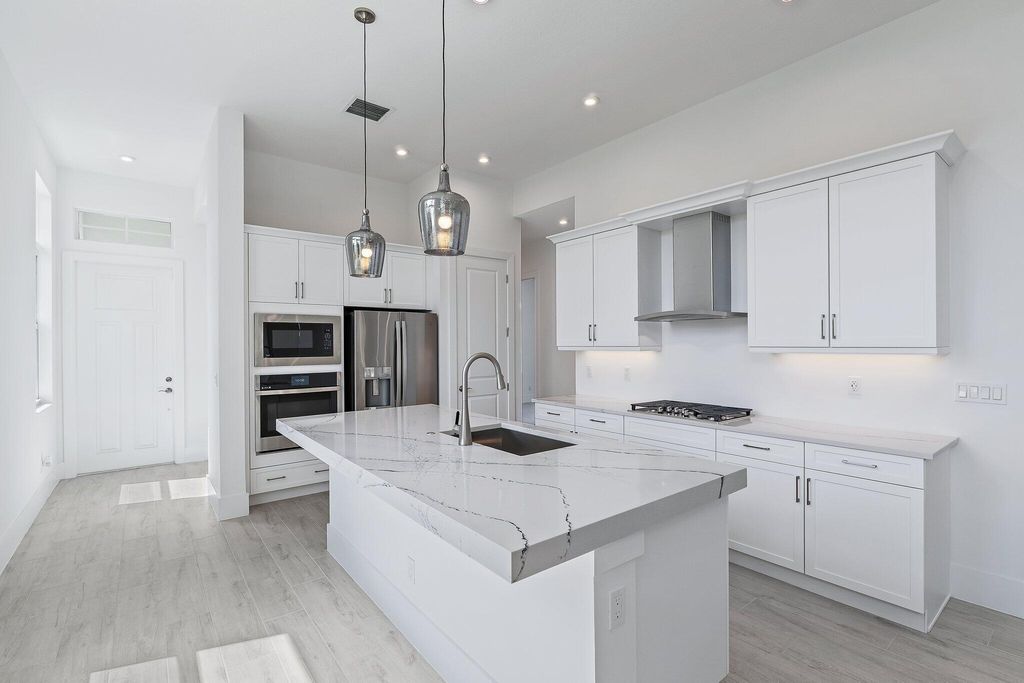 Photo of 359 SE Via Sangro, Port Saint Lucie, FL 34952 (MLS # R11053435)