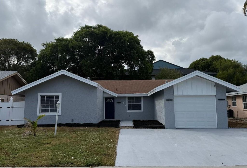 Photo of 1312 SW 75th Ave, North Lauderdale, FL 33068 (MLS # F10537688)