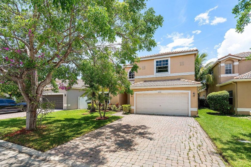 Photo of 4074 NW 62nd Drive, Coconut Creek, FL 33073 (MLS # R11106351)