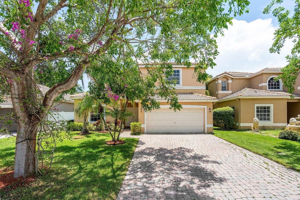 Photo of 4074 NW 62nd Drive, Coconut Creek, FL 33073 (MLS # R11106351)
