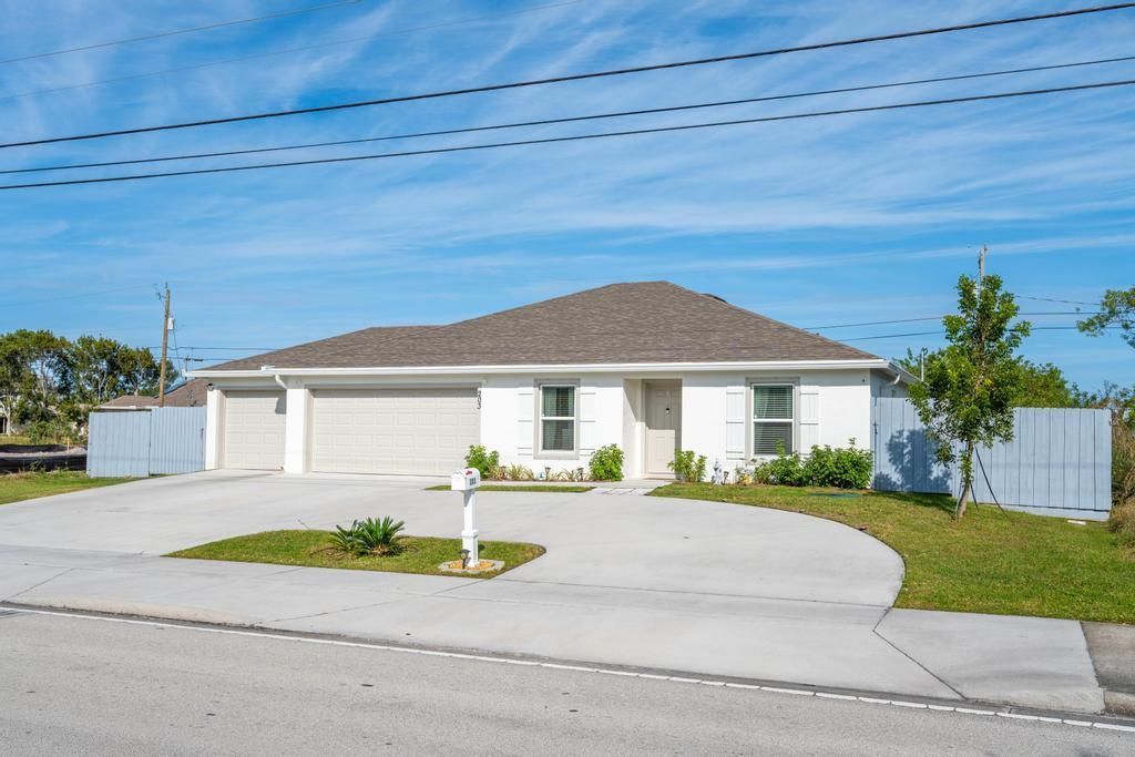 Photo of 203 SW Becker Road, Port Saint Lucie, FL 34953 (MLS # R10949302)