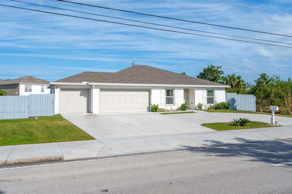 Photo of 203 SW Becker Road, Port Saint Lucie, FL 34953 (MLS # R10949302)