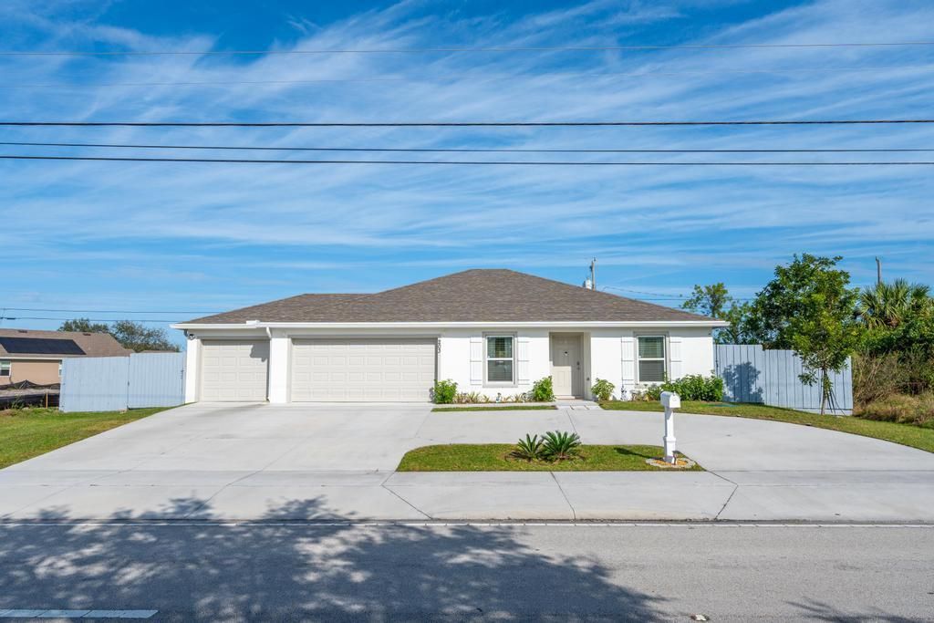 Photo of 203 SW Becker Road, Port Saint Lucie, FL 34953 (MLS # R10949302)