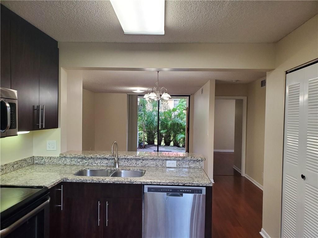 Photo of 5741 Riverside Dr Dr #106, Coral Springs, FL 33067 (MLS # F10315531)