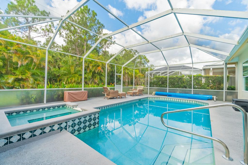 Photo of 9407 Poinciana Court, Fort Pierce, FL 34951 (MLS # R11102025)