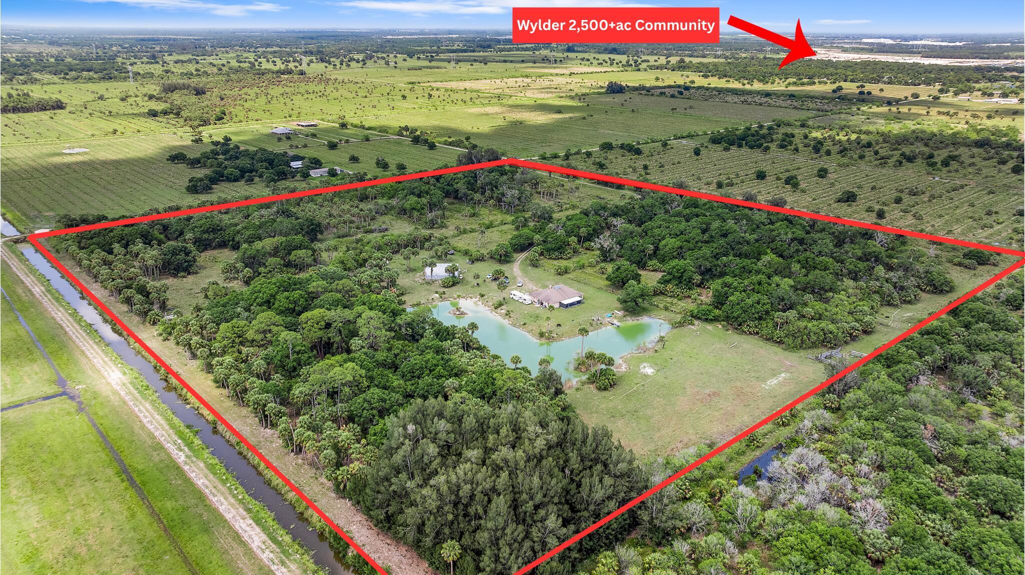 YOU NEED TO BUY THIS DIRT! 38.66 acres of prime real estate located smack dab in the middle Saint Lucie counties BIGGEST & NEWEST real estate development boom! Surrounding developments includes 2,500+ acres of Wlyder's residential housing communities, 200 acre Koa Wave park, plans for 3 other large housing communities, various commercial and retail zoned projects, and a proposed 37 acre Multi Sports Facility. This property is located within the Urban Service boundary and ready to graduate to it's full potential! The lot is perfectly squared off and is almost entirely surrounded by various development company owned land. If development isn't your thing and you're looking for your next ranch home, this property will work for that vision as well! 2001 CBS custom built home and....