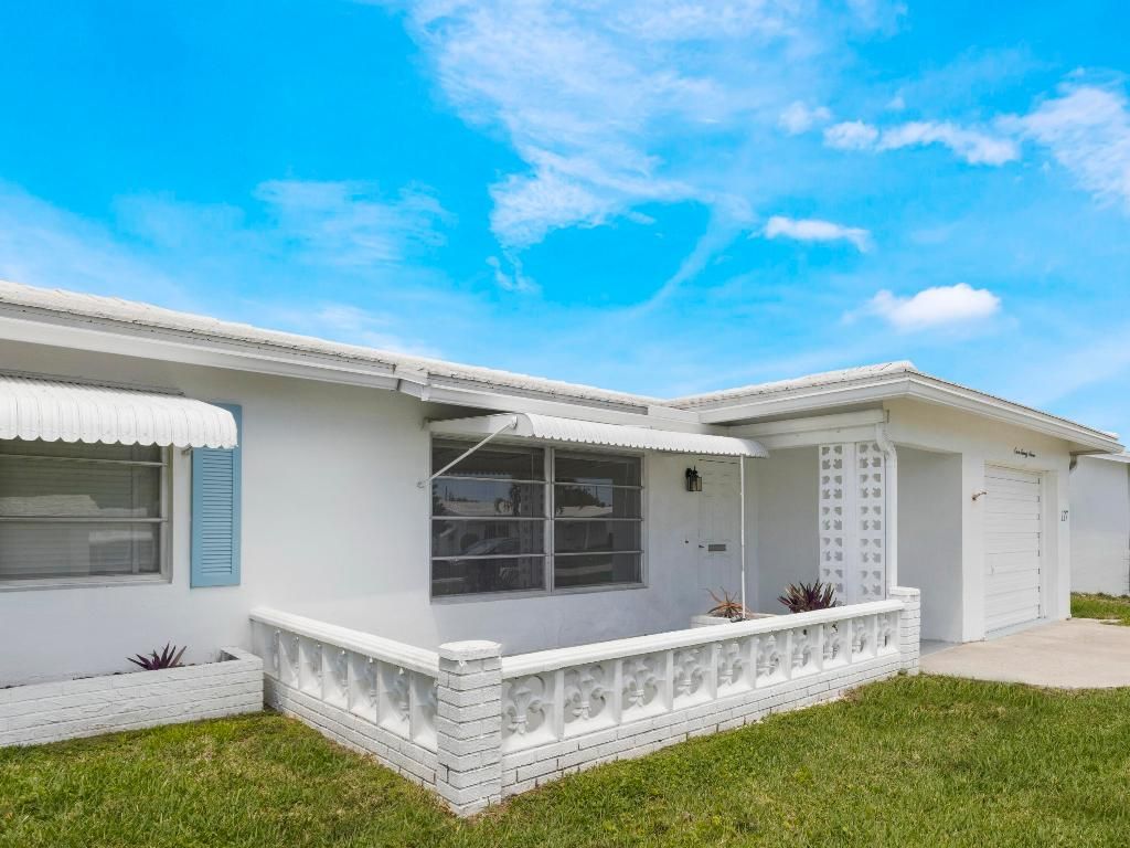 Photo of 127 Leisureville Boulevard, Boynton Beach, FL 33426 (MLS # R11135388)