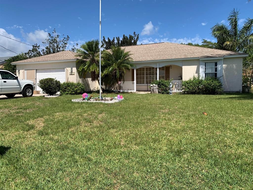 Photo of 1522 SE Berkshire Boulevard, Port Saint Lucie, FL 34952 (MLS # R10783664)