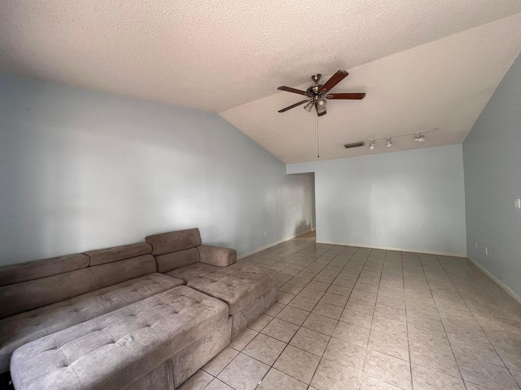 Photo of 3823 E Woodridge Terrace, Palm Springs, FL 33461 (MLS # R11044416)