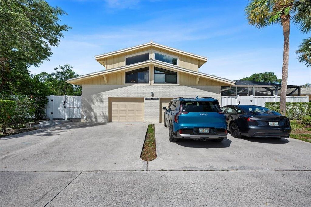 Photo of 12556 Woodmill Drive, Palm Beach Gardens, FL 33418 (MLS # B26019940)